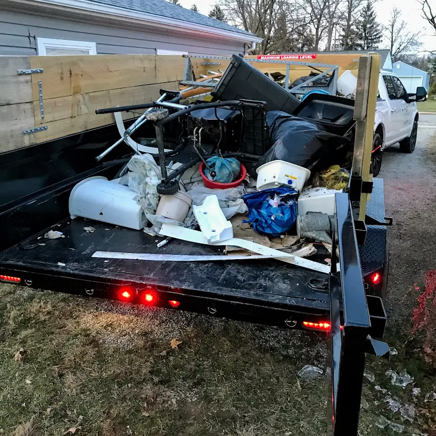 Roll-off dumpster delivered to a residential driveway in Dexter